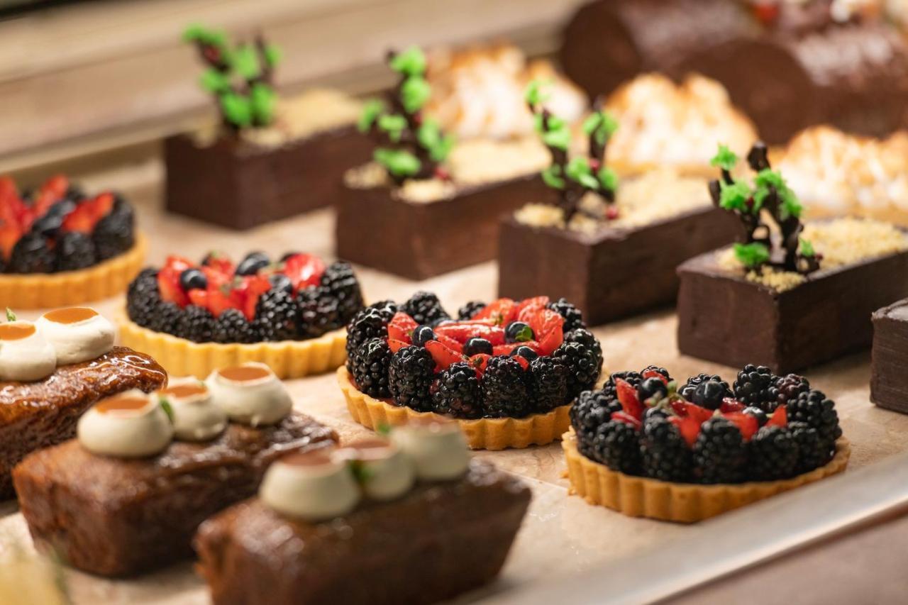 Abesq Doha Hotel And Residences, An Ihg Hotel Exterior photo A selection of petits fours