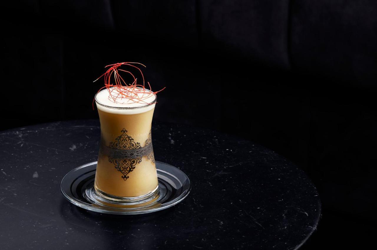 Abesq Doha Hotel And Residences, An Ihg Hotel Exterior photo A glass of eggnog