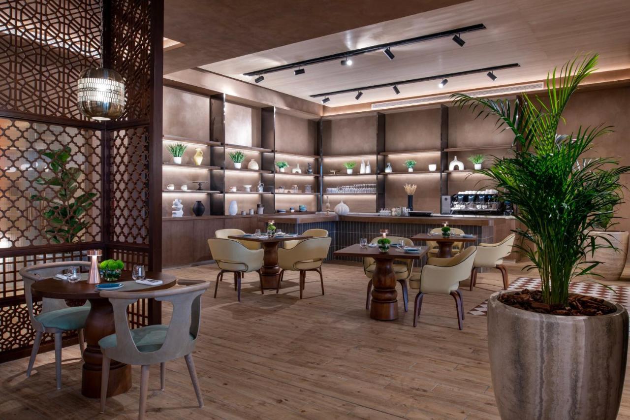 Abesq Doha Hotel And Residences, An Ihg Hotel Exterior photo The interior of the restaurant