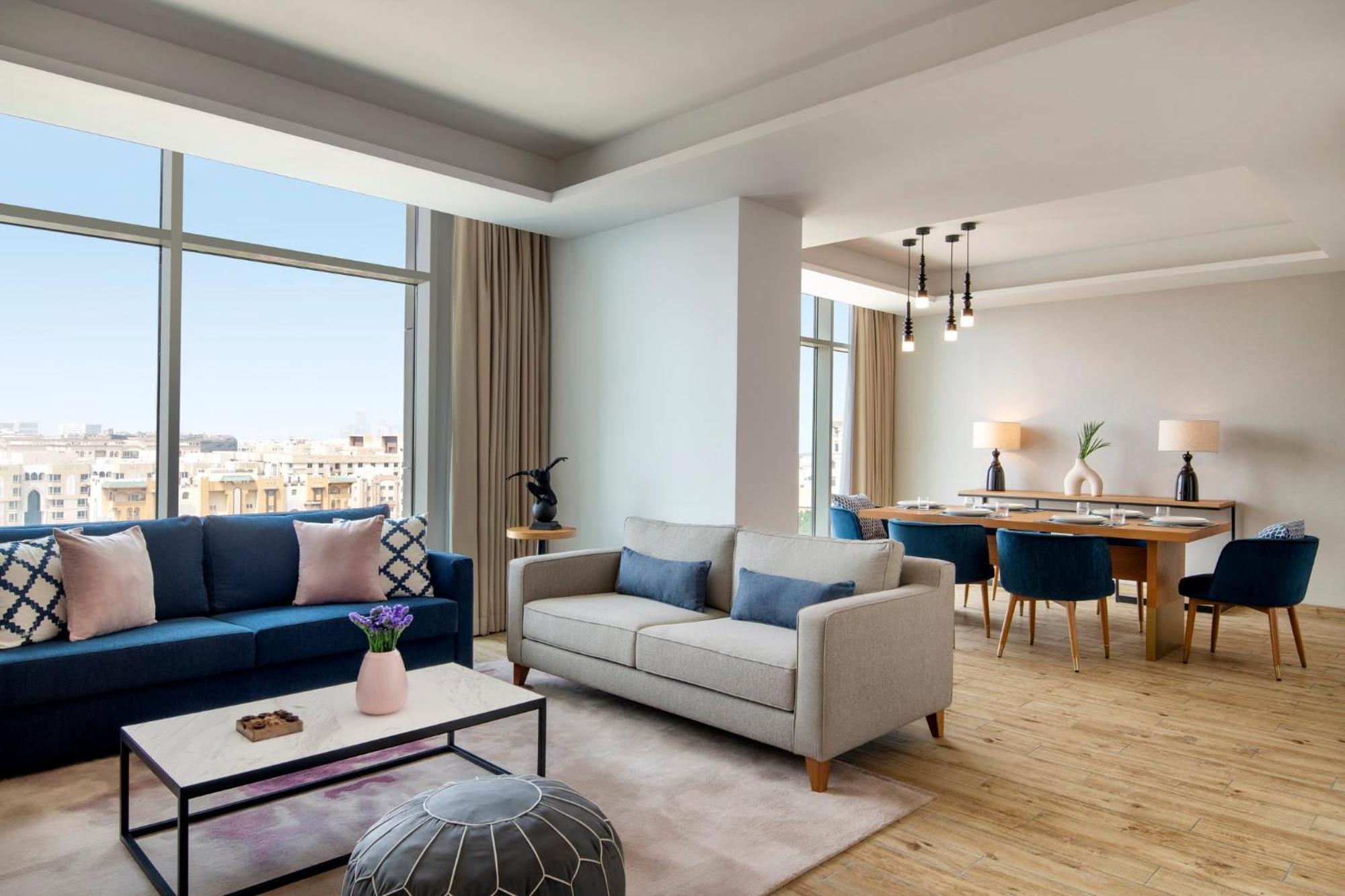 Abesq Doha Hotel And Residences, An Ihg Hotel Exterior photo A living room at the hotel
